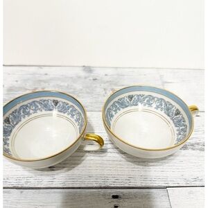 TWO CHARLES AHRENFELDT LIMOGES PORCELAIN CUPS  BLUE SWIRL TOPIARY